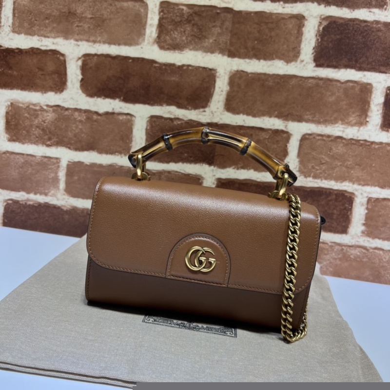 G*u*i top handle bags
